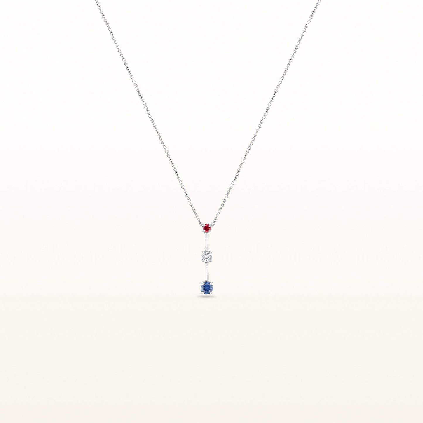 Diamond, Ruby, and Blue Sapphire Three-Stone Pendant in 14kt White Gold