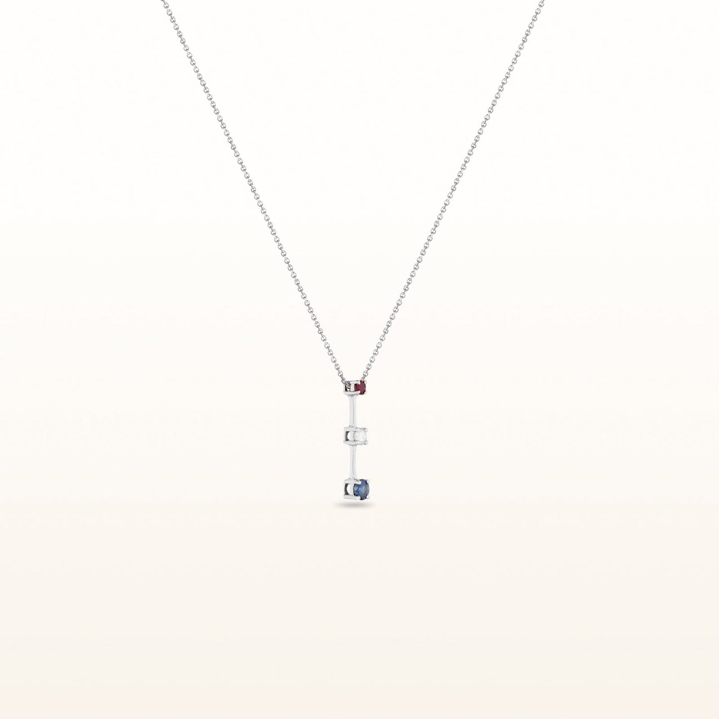 Diamond, Ruby, and Blue Sapphire Three-Stone Pendant in 14kt White Gold