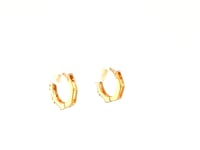 Sparkly Huggie Hoops in 14k Yellow Gold