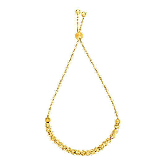 Adjustable Bracelet with Textured Beads in 14k Yellow Gold