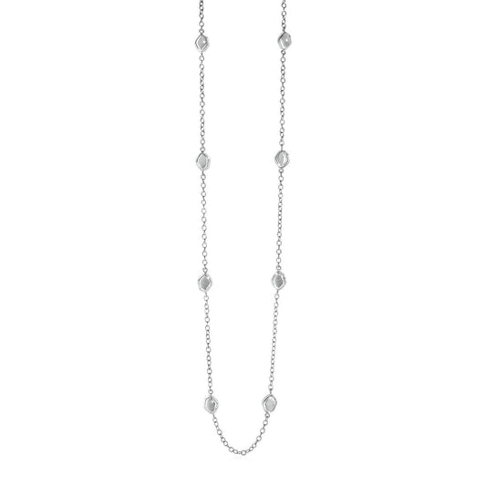 Station Necklace with Textured Beads in Sterling Silver